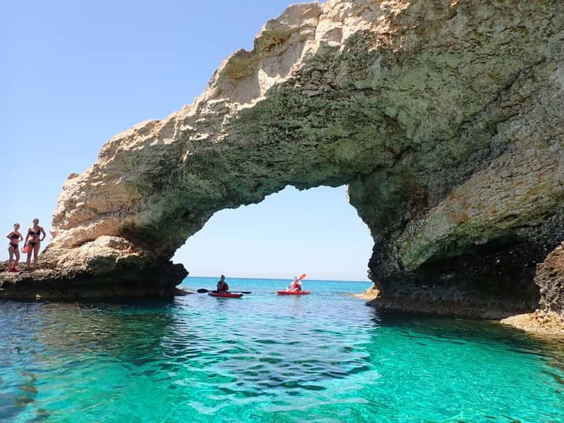 4-hour Ayia Napa SeaCaves Guided Kayaking from Limnara beach - Paddling beneath Lovers’ Bridge
