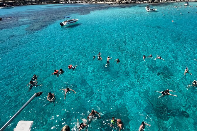 Blue Lagoon cruise: giant slide, music & Paphos hotel transfers - Seeing the Akamas coast from the water