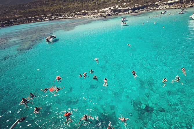 Blue Lagoon cruise: giant slide, music & Paphos hotel transfers - Leaving Latchi Harbor