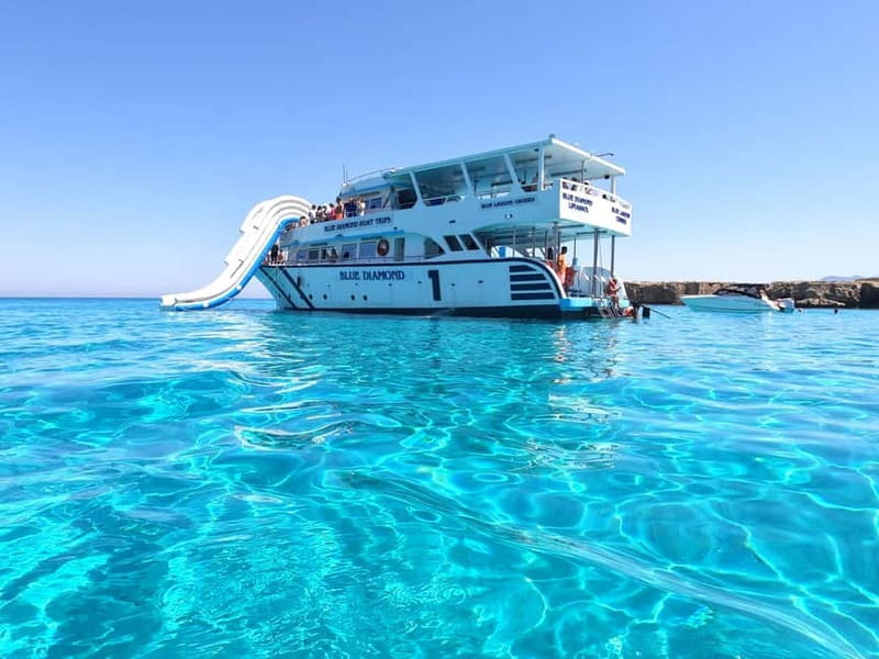 Blue Lagoon Cruise: Waterslide Adventure from Latchi Harbour - The waterslide, with a useful warning