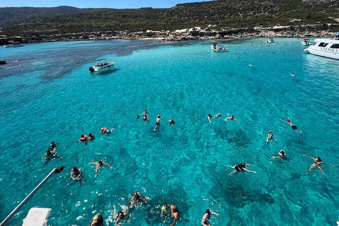 Blue Lagoon trip with slide & music departing from Latchi harbour - Music, slide, and the social side of the cruise