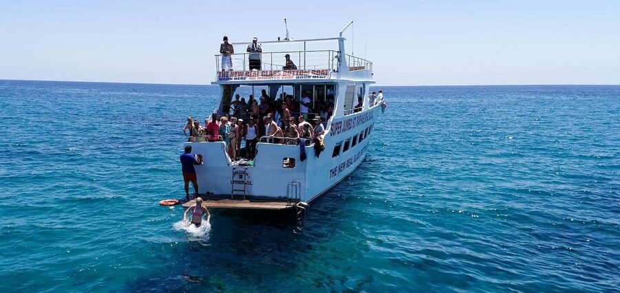 FROM PAPHOS: 1.5 HRS Glass Bottom Boat Cruise with swimming - Reefs, fish, and the sea sponge display