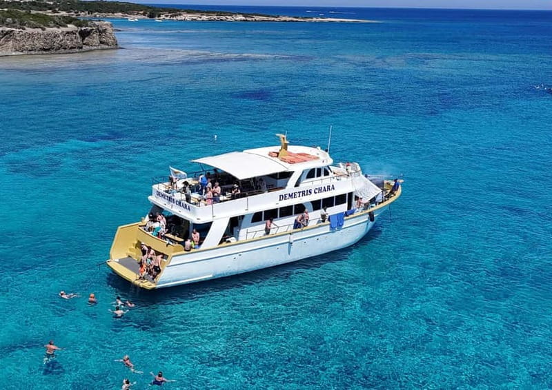 From Paphos: Blue Lagoon Tour with BBQ and Hotel Pickup - Boarding the Demetris Chara BBQ boat