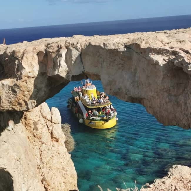 From Protaras: Cruise to Blue Lagoon, Turtle Cove & Sea Cave - Cape Grecos caves, rock formations, and Lovers Bridge