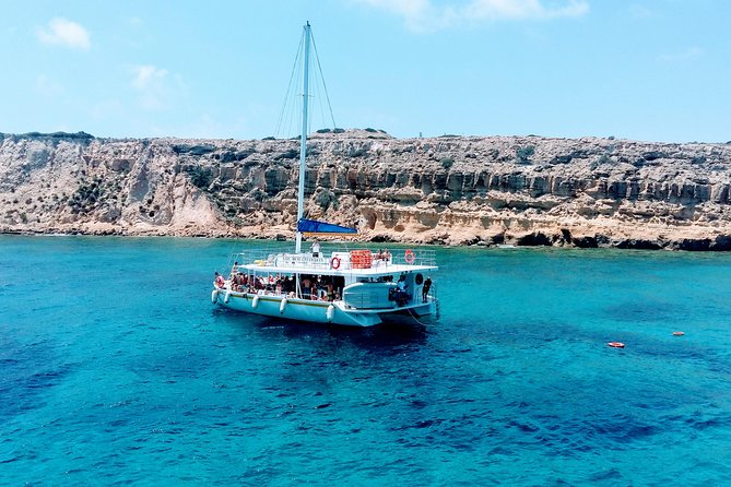 Full-Day Family Catamaran Cruise from Limassol with Lunch - Cape Gata: your first swim and snorkel stop