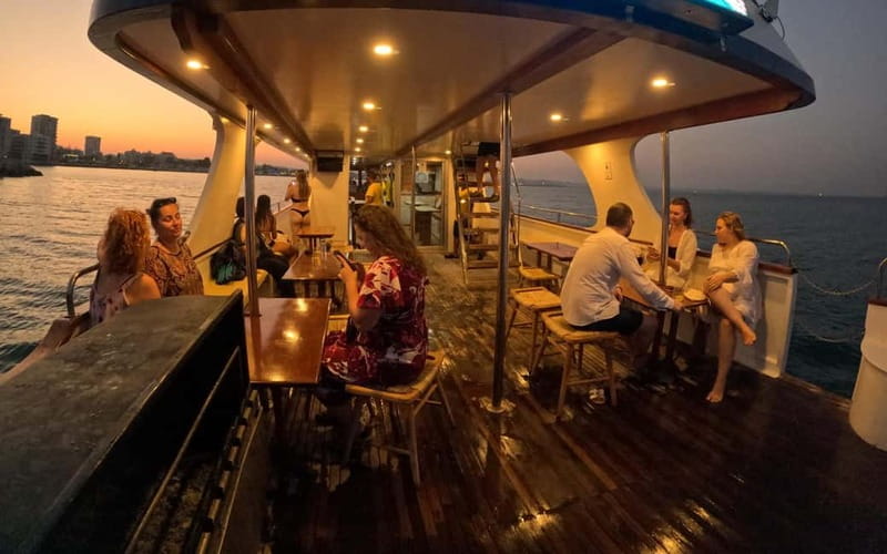 Larnaca: Sunset Cruise with a Glass of Wine - Mackenzie Beach and the 30-minute swim