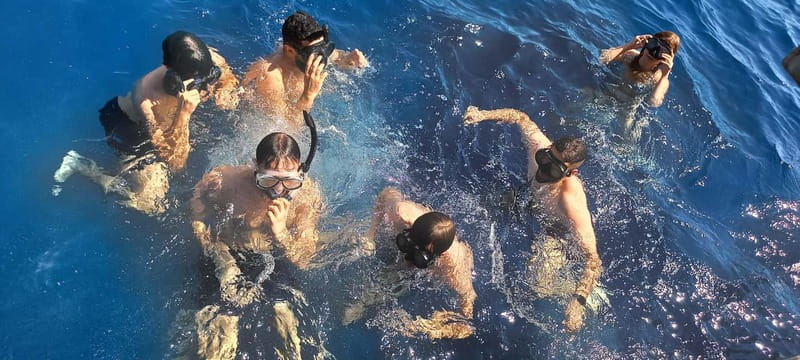 Larnaca: Yellow Submarine Swim Cruise with Unlimited Drinks - Crew, languages, and the feel on board