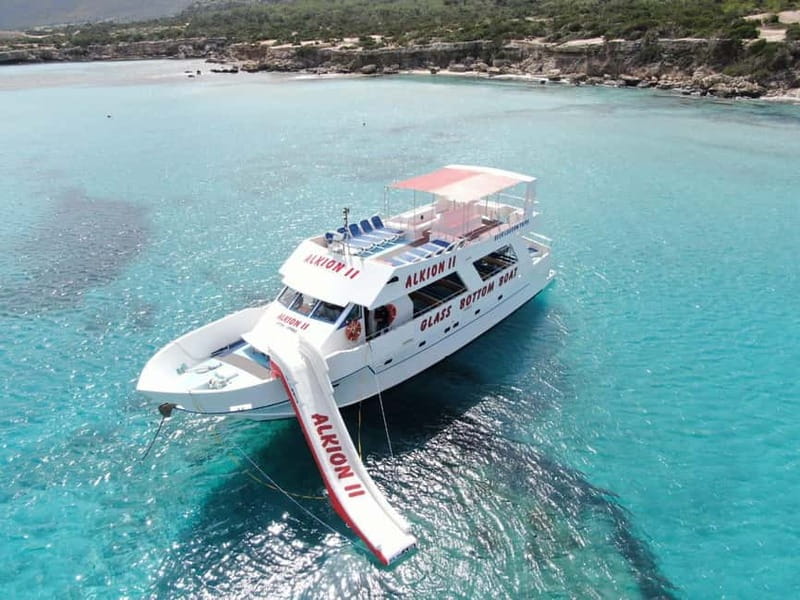 Latchi: Blue Lagoon Glass Bottom Boat Cruise with Drinks - The Baths of Aphrodite and the first coastal views