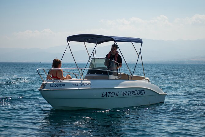 Luxury Eden 18 Private Self-drive boat hire to Blue Lagoon & more - Taking the wheel at Latchi Harbour