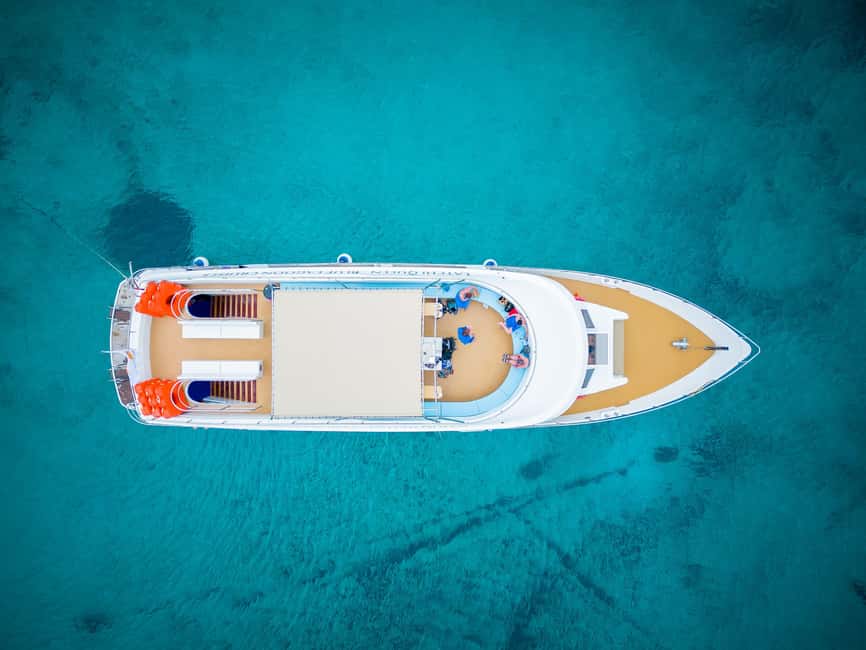 Paphos: Blue Lagoon Half Day Boat Trip with Hotel Transfer - From Paphos to Latchi by air-conditioned bus