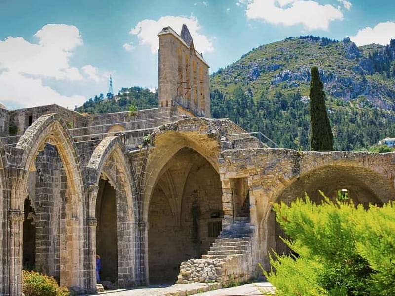 Paphos: Kyrenia, St. Hilarion Castle & Bellapais Abbey Tour - The vehicle, guide, and nine-hour schedule