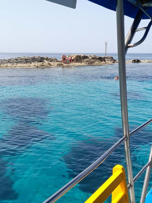 Paphos: The Yellow Glass-Bottom Boat Cruise Swim & Snorkel - The Moulia Islands and their weathered rocks