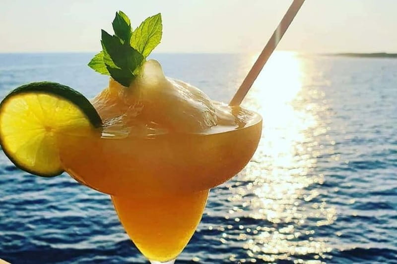 Paphos: Wave Dancer Sunset Cruise with BBQ and Swimming - The swimming stop and kayak time