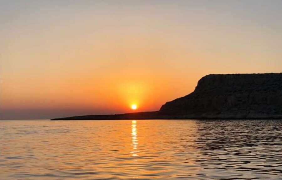 Protaras Blue Lagoon Sunset Tour with Pizza & Champagne - Blue Lagoon while the light softens