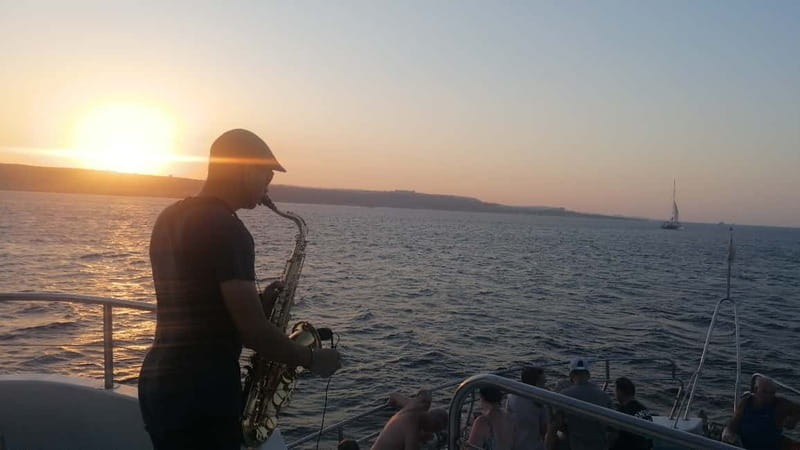 Protaras: Turtle Cove & Blue Lagoon Sunset Cruise - Konnos Beach and the first swim