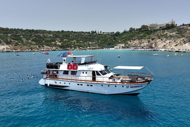 Protaras: Waterworld Value Cruise. 3 Swim Stops & slide! - Touching the rocks by Agioi Anargyroi