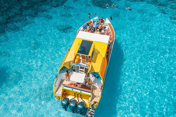 Yellow Boat Cruises: Afternoon Family Blue Lagoon & Turtle Cruise - Konnos Bay offers a quieter beach view